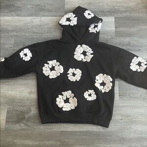 Denim Tears Black Hoodie with White Floral Design